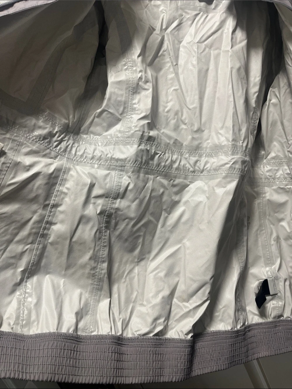 The North Face Light Gray women’s' Hooded Rain Jacket